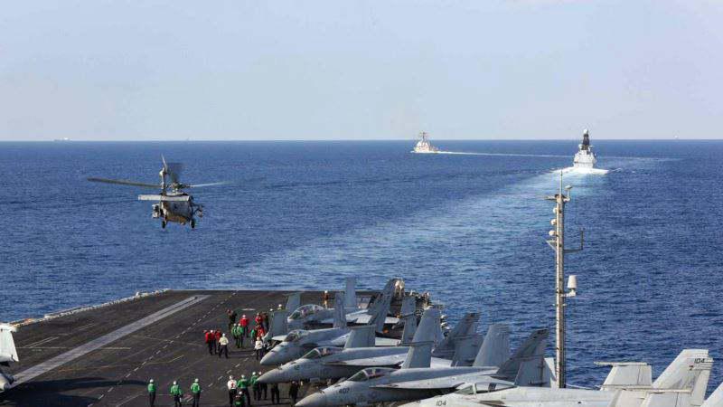 ifmat-US Navy says Iran Revolutionary Guards navy harassed its vessels in Gulf