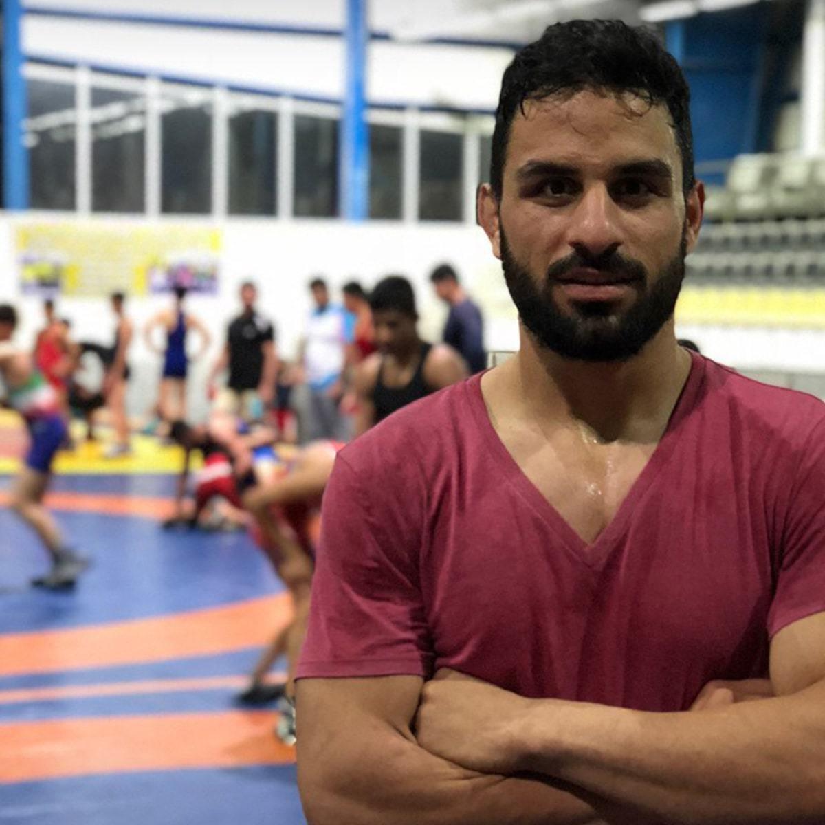 ifmat -Iran regime secluded witness to brutal torture of champion wrestler